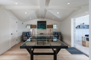 Peninsula point game room with ping pong table